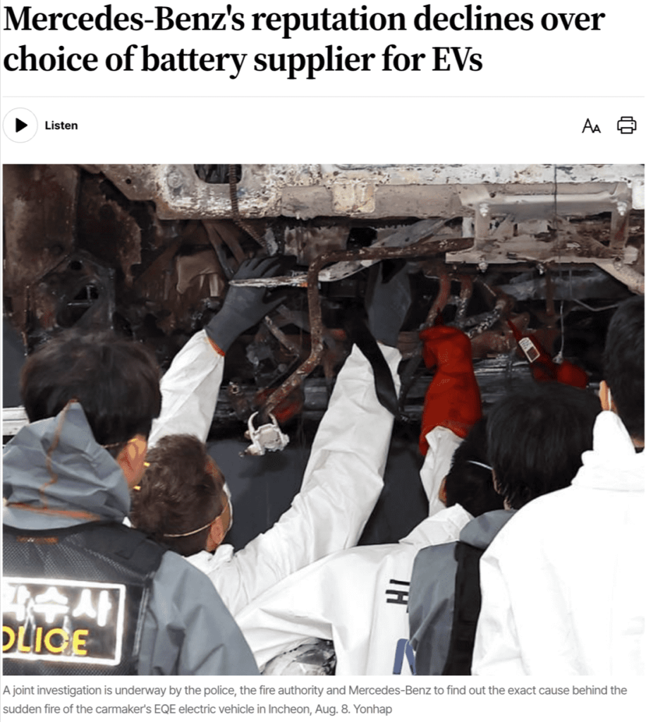 Investigators examine the burnt underside of a Mercedes-Benz EQE electric vehicle after a fire incident in Incheon